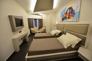 Chambre Deluxe avec lits jumeaux | Bureau, Wi-Fi gratuit