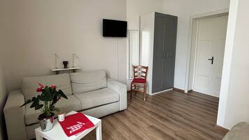 Chambre Quadruple Familiale | Coin séjour