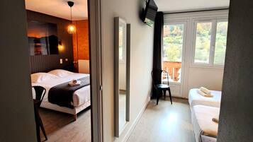 Family Quadruple Room, Balcony, Mountain View | Individually decorated, individually furnished, blackout curtains