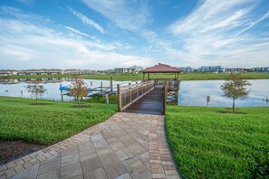 Stroll along the tranquil lakeside walkway to a picturesque gazebo with a vantage point over the water.