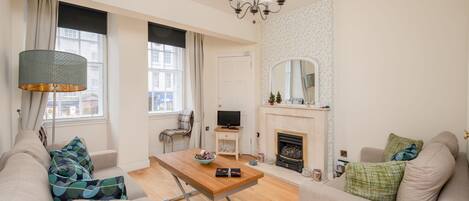 デラックス アパートメント | リビング エリア | 薄型テレビ