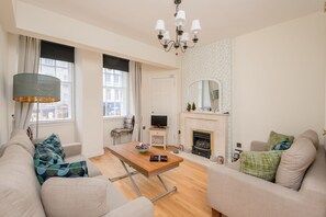 Deluxe appartement | Woonruimte | Flatscreentelevisie