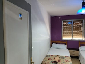 Blackout curtains, WiFi, bed sheets