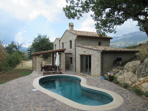 Rustic stone house with a modern touch