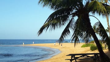 Espreguiçadeiras, toalhas de praia