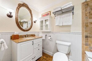 Combined shower/tub, hair dryer, towels, soap