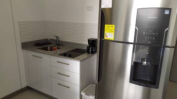 Fridge, microwave, coffee/tea maker, blender