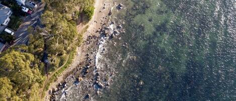En la playa, toallas de playa
