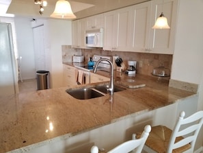Condo, Multiple Beds, Patio, Ocean View | Private kitchen | Fridge, microwave, stovetop, dishwasher