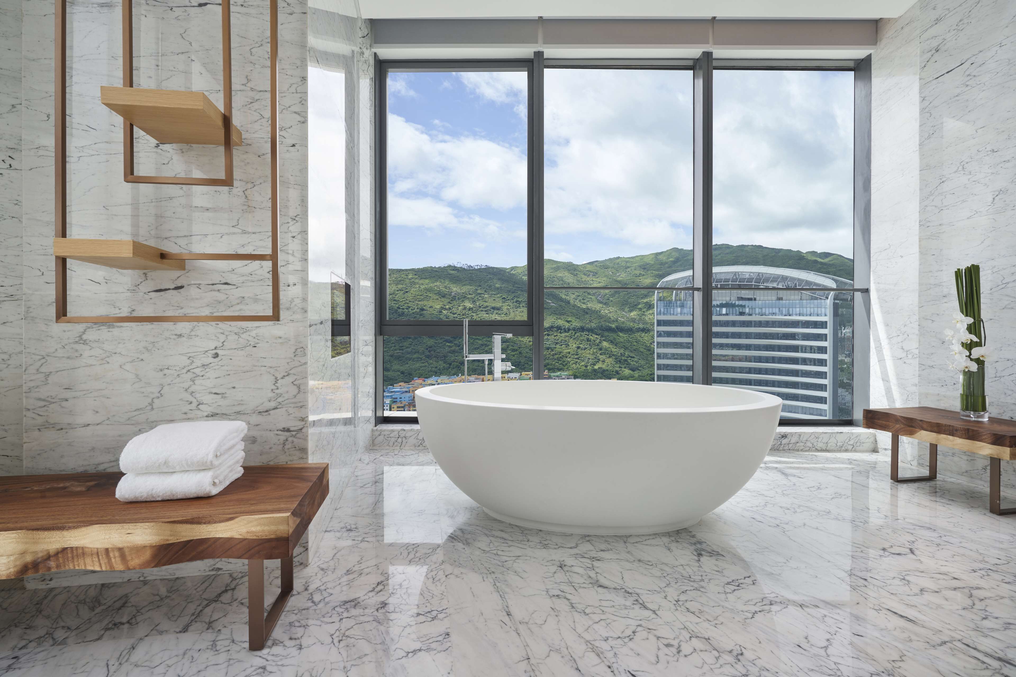 presidential suite | bathroom | shower, rainfall showerhead, hair dryer, bathrobes