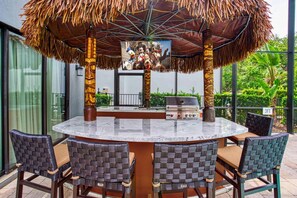 Outdoor dining - Built For Vacation | South-Facing, Large Screen Pool, Splash Pad, Game,Movie Room (Four Corners)