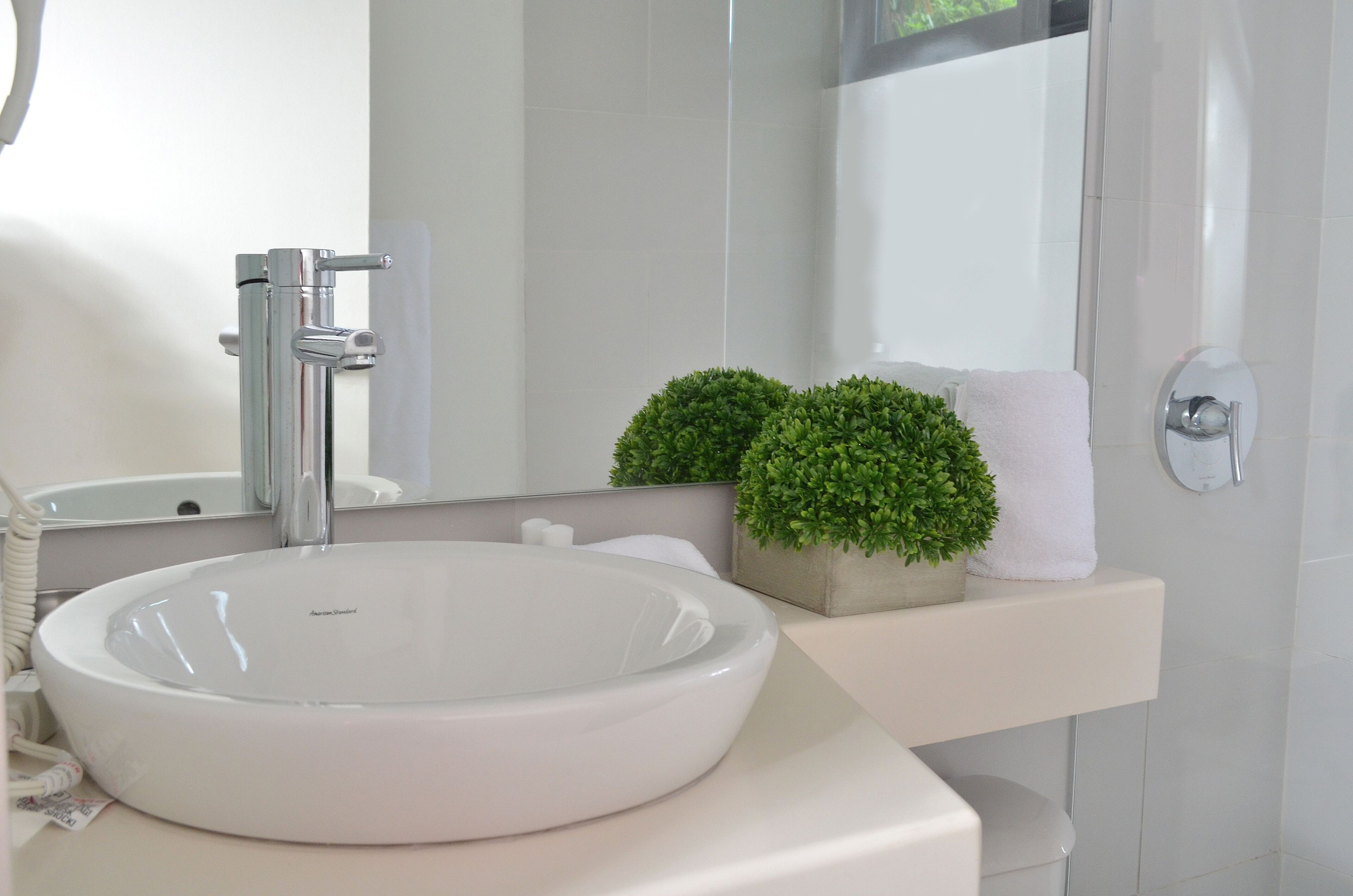 executive apartment | bathroom | shower, rainfall showerhead, towels, soap