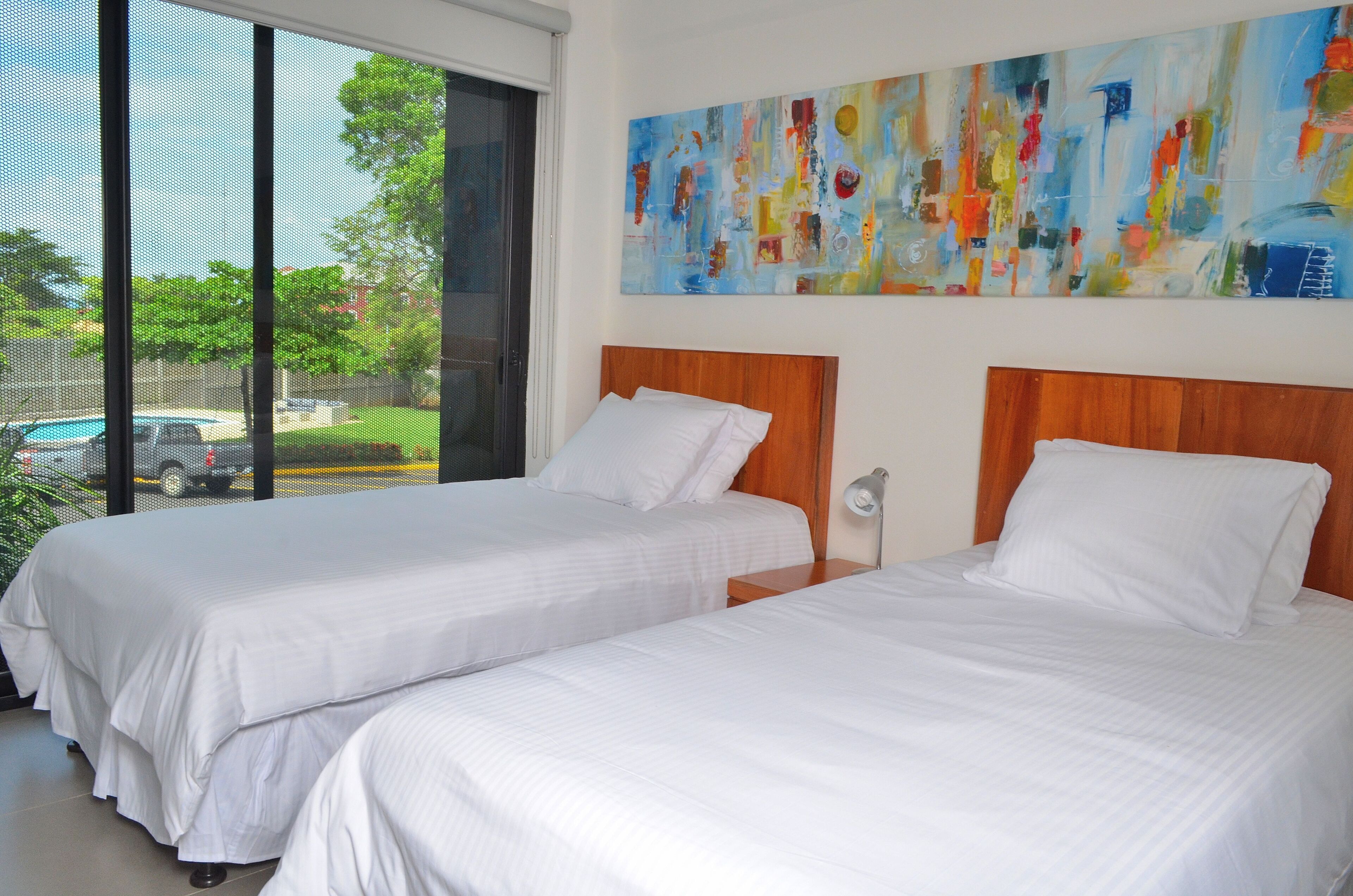 executive apartment | premium bedding, down duvets, in-room safe, blackout curtains