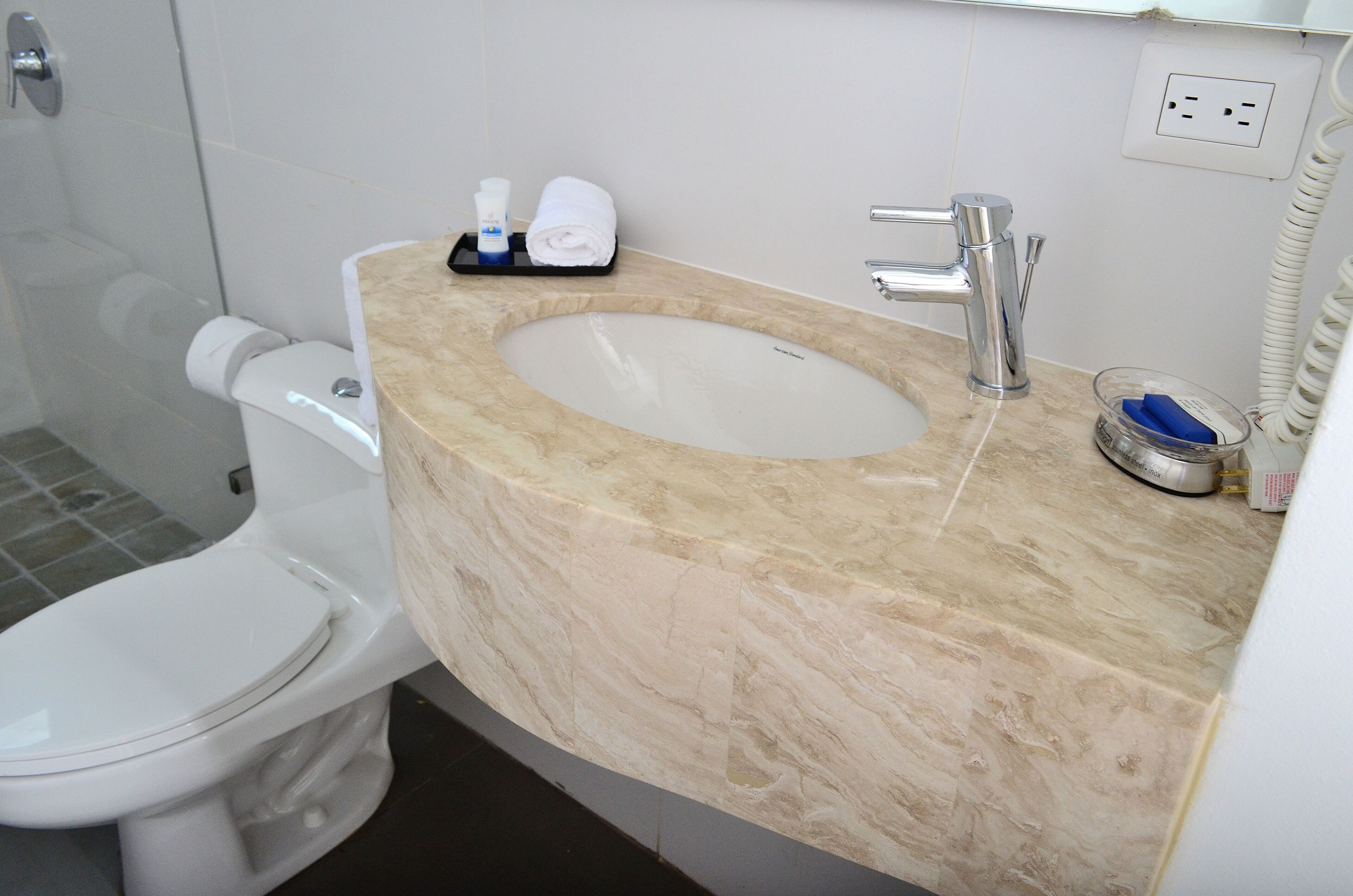 family apartment | bathroom | shower, rainfall showerhead, towels, soap