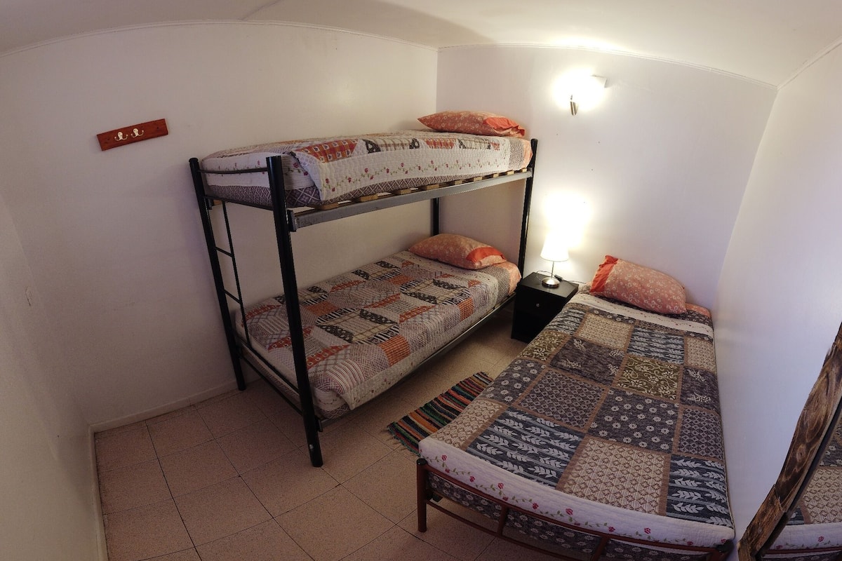 Triple Room | Iron/ironing board (on request), bed sheets