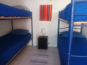 Iron/ironing board, bed sheets - Hostal Covaine - Hostel (San Pedro de Atacama)