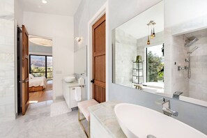 Bathtub, hair dryer, towels, soap