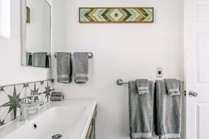 Hair dryer, towels, soap, shampoo