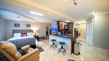 1 bedroom, desk, iron/ironing board, travel cot