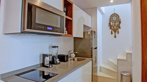 Penthouse Deluxe, 1 très grand lit | Cuisine privée