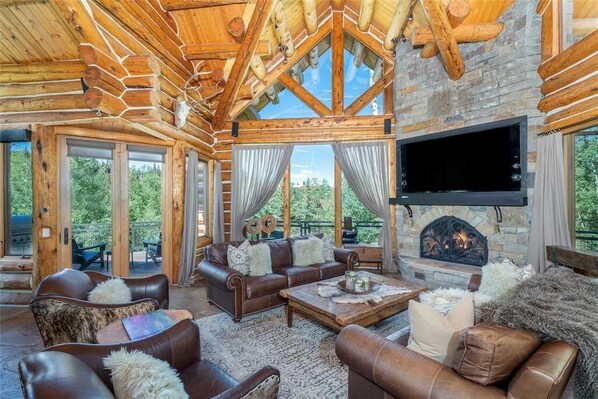 House, Multiple Beds (SLOPESIDE LODGE) | Living room | Flat-screen TV, fireplace