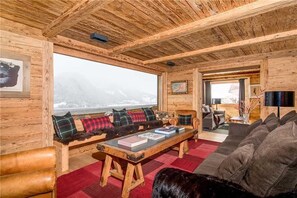 Villa, Multiple Beds (Chalet Isabel) | Living room | Flat-screen TV, fireplace