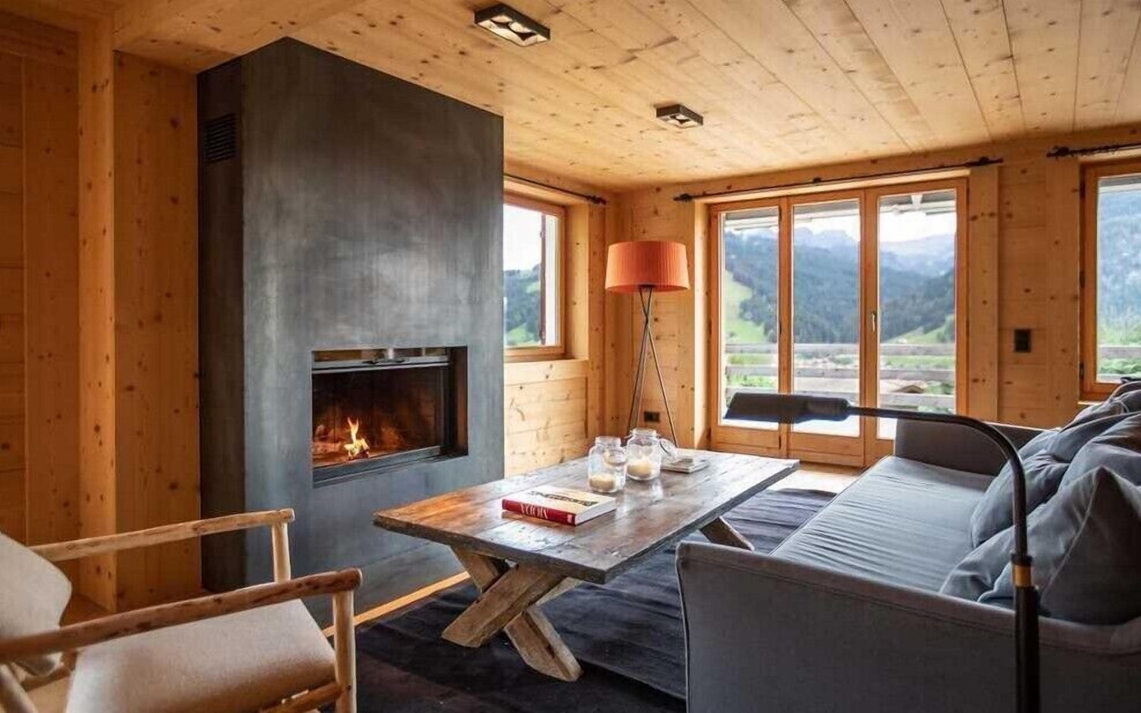 Villa, Multiple Beds (Chalet Isabel) | Living room | Flat-screen TV, fireplace