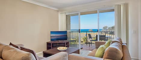 Apartment, 2 Bedrooms, Ocean View | Living area | Flat-screen TV, table tennis