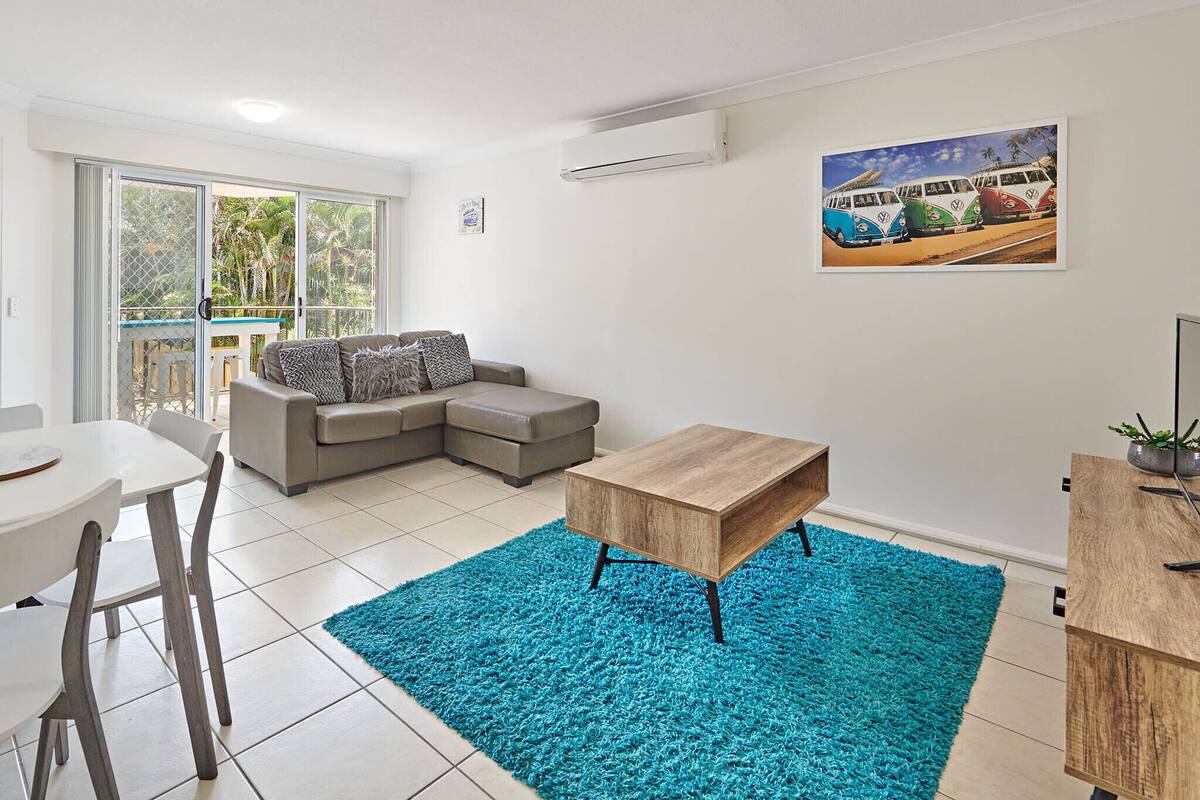 Basic Apartment, 2 Bedrooms, Poolside | Living area | Flat-screen TV, table tennis