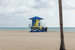 On the beach, sun-loungers, beach towels