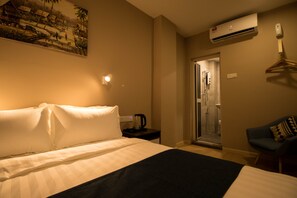 Memory foam beds, blackout drapes, iron/ironing board, free WiFi