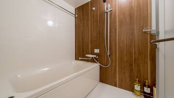 Origami Room - 2 Double & sofa bed (Please see all policies and info before you book) | Bathroom | Separate tub and shower, free toiletries, hair dryer, slippers