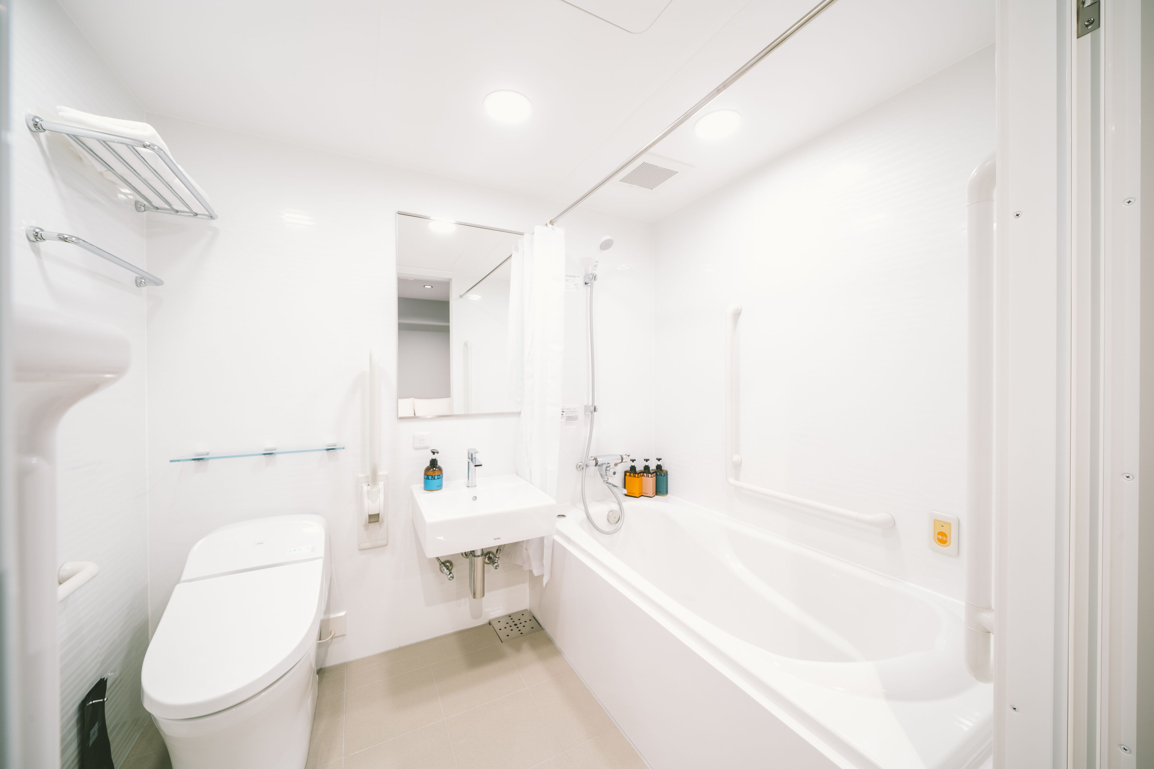 universal room | bathroom | free toiletries, hair dryer, slippers, electronic bidet