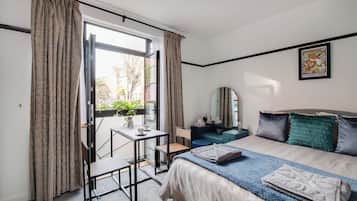 1 habitación, tabla de planchar con plancha, wifi gratis y ropa de cama