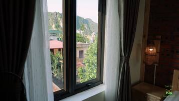 Quarto casal luxo | Vista para a montanha