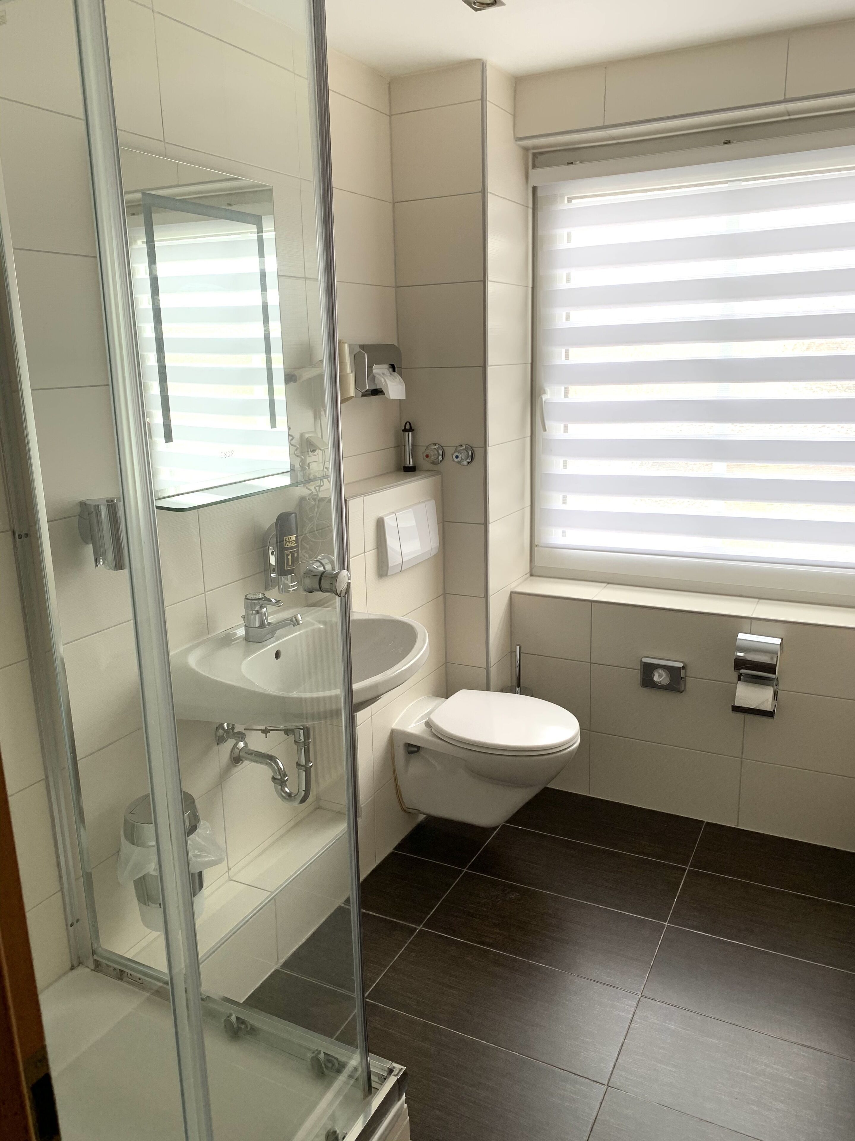 shower, free toiletries, hair dryer, slippers