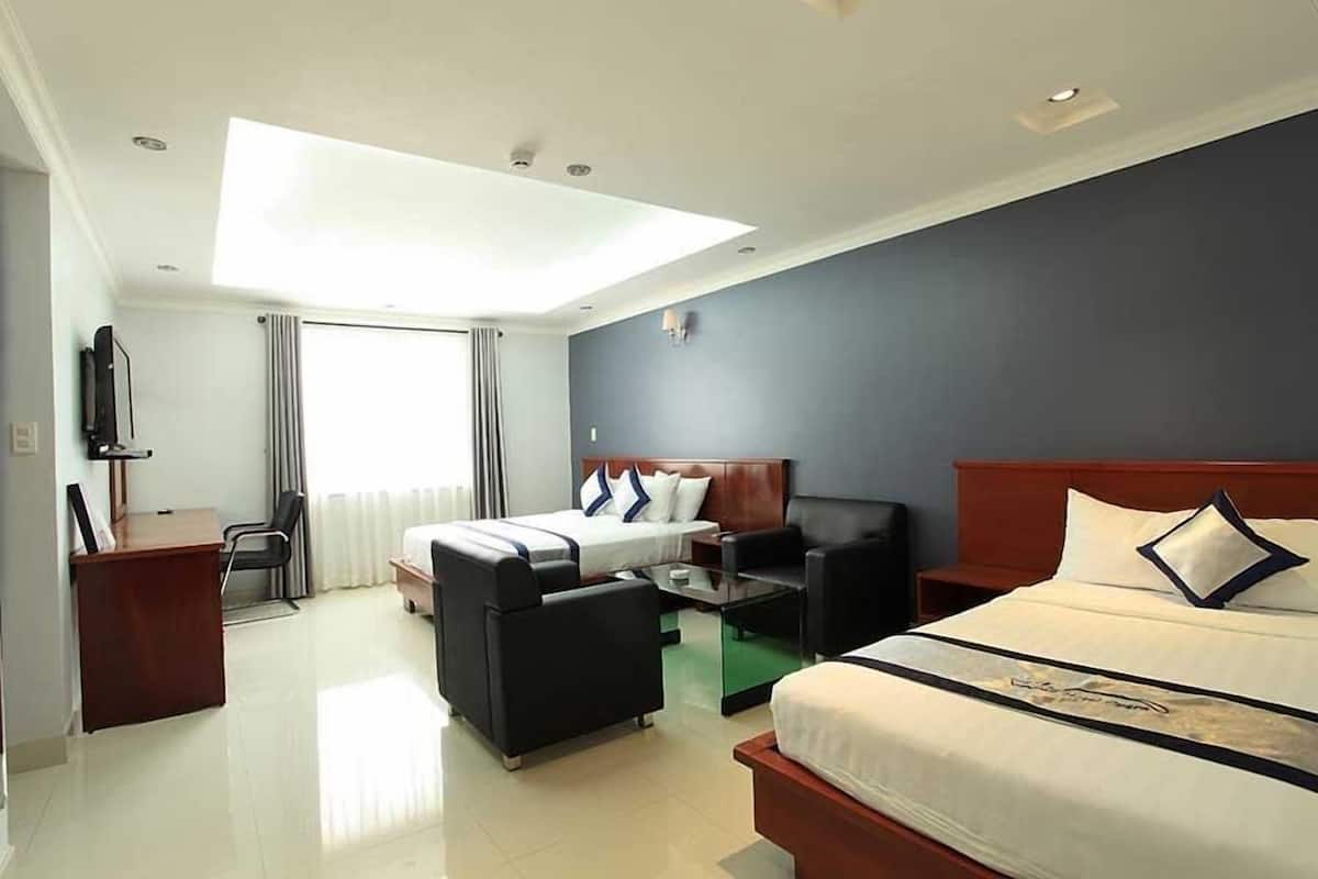 Family Room | Free minibar items, desk, free WiFi, bed sheets
