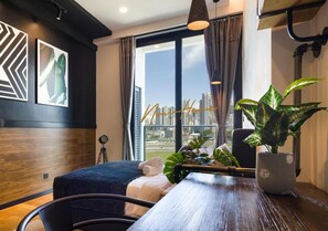 Signature Suite | Desk, iron/ironing board, bed sheets