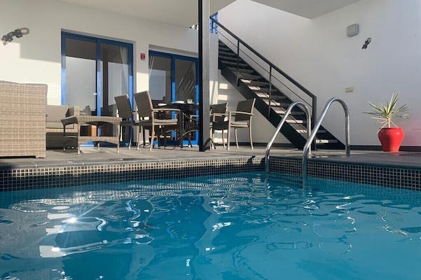 Rear terrace with private heated pool