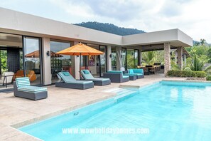 Outdoor pool, pool umbrellas, pool loungers