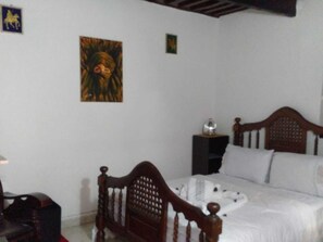 Economy Double Room | Laptop workspace, iron/ironing board, free WiFi, bed sheets