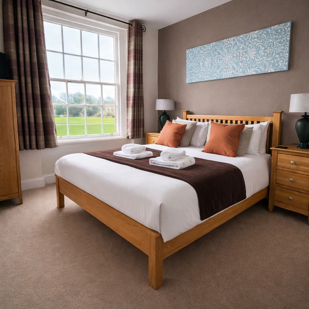 Suite superior | Decoració individual, mobiliari individual i planxa i posts de planxar 