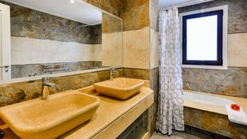 Apartment, 1 Bedroom, Pool Access | Bathroom | Shower, hair dryer, bidet, towels