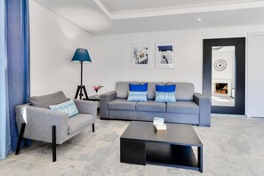 Apartment, 1 Bedroom, Pool Access | Living room | 42-cm flat-screen TV with satellite channels, TV, fireplace - Falesia Beach B (Albufeira)