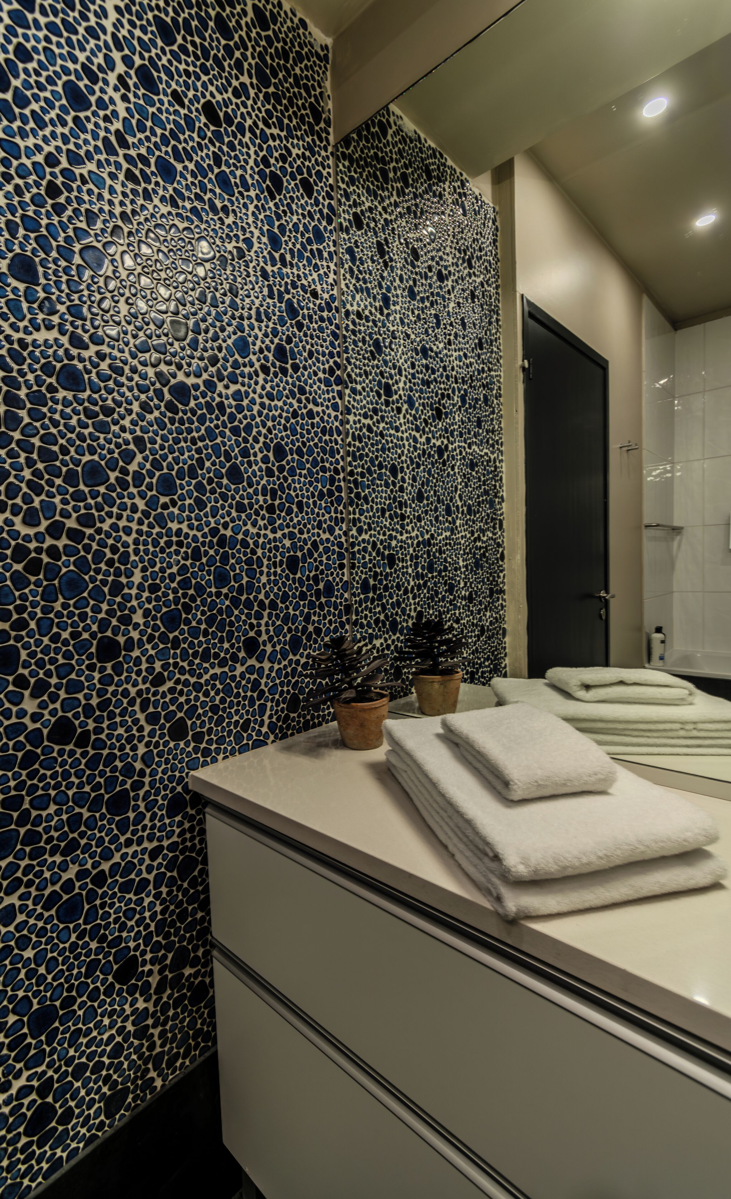 king suite with balcony and mountain view | bathroom | free toiletries, hair dryer, towels