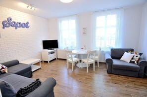 Apartment | Living room | 42-inch flat-screen TV with cable channels, LCD TV