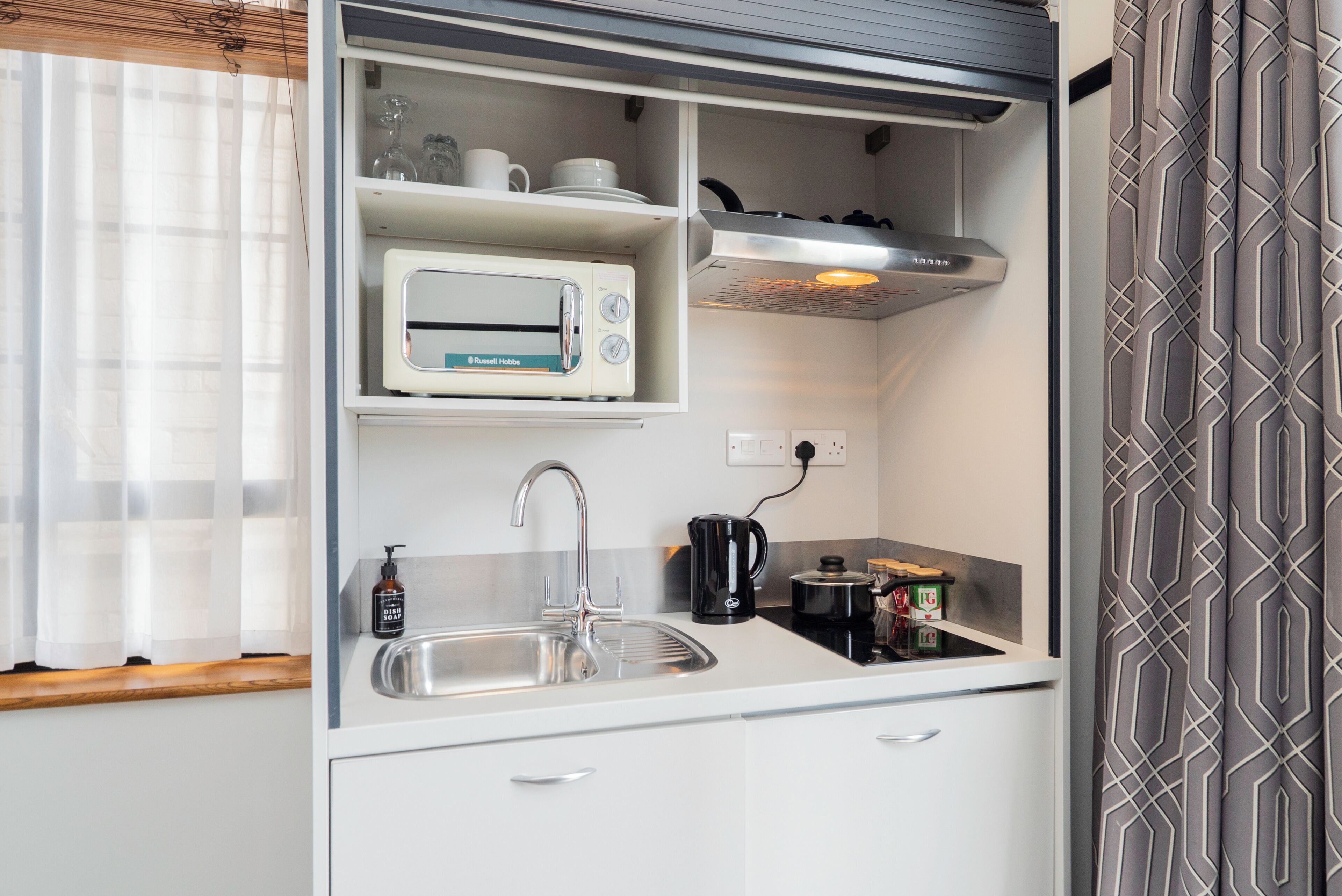 Fridge, microwave, stovetop, cookware/dishes/utensils