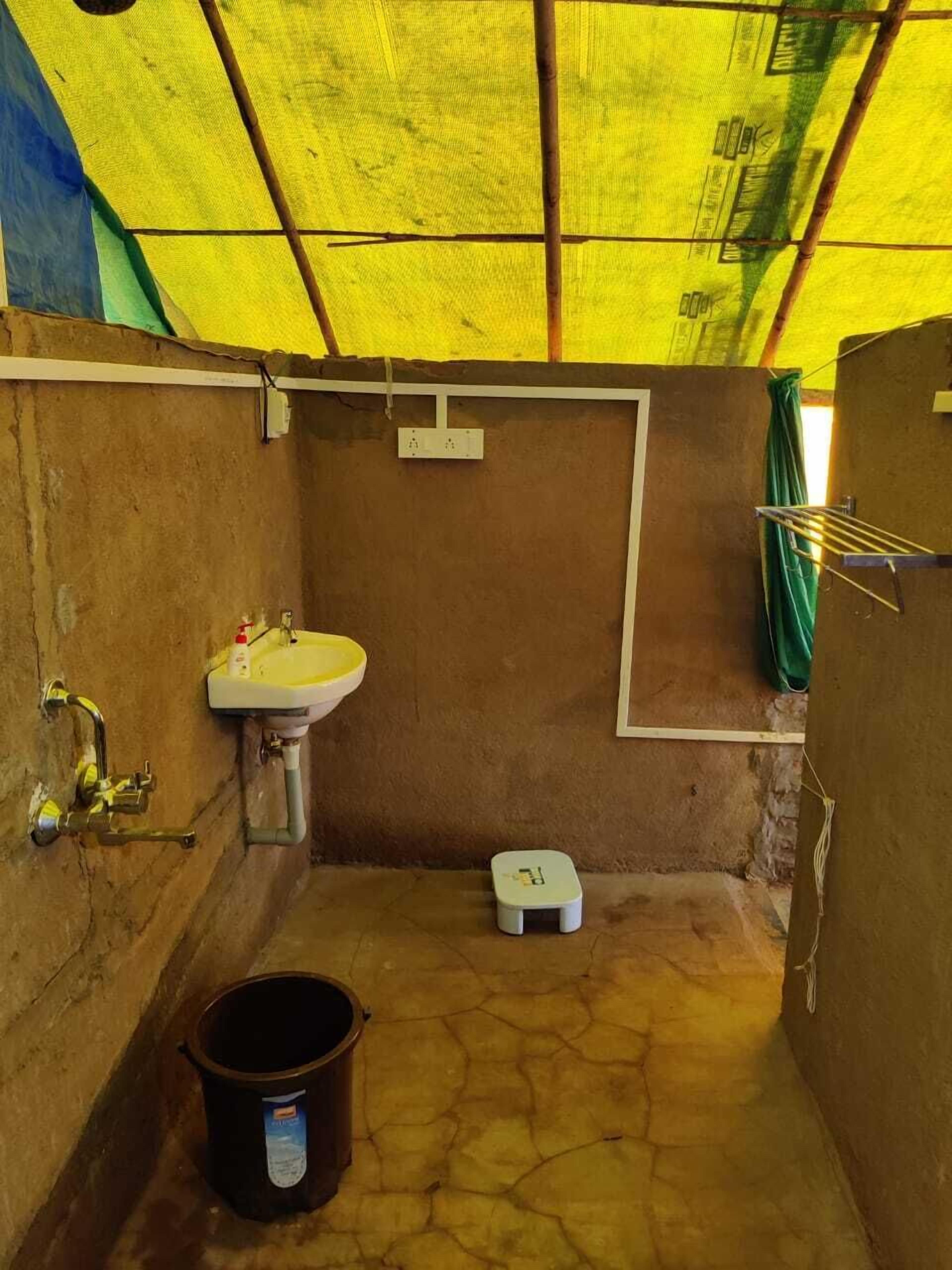 Shower, rainfall showerhead, towels, soap