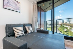 City Apartment, 1 Bedroom, Non Smoking | Living area | Smart TV, Netflix, streaming services - Ehome - Brand New In CBD with Pool, Sauna, Gym, Netflix (Auckland)