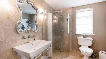 Bathtub, jetted tub, hair dryer, towels